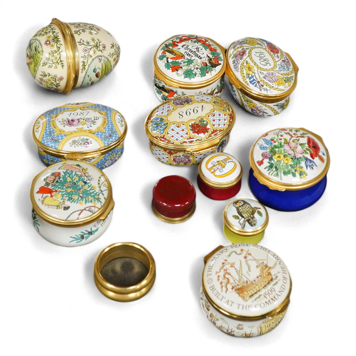 A collection of Halcyon days enamel patch boxes to include one commemorating the Mary Rose ship